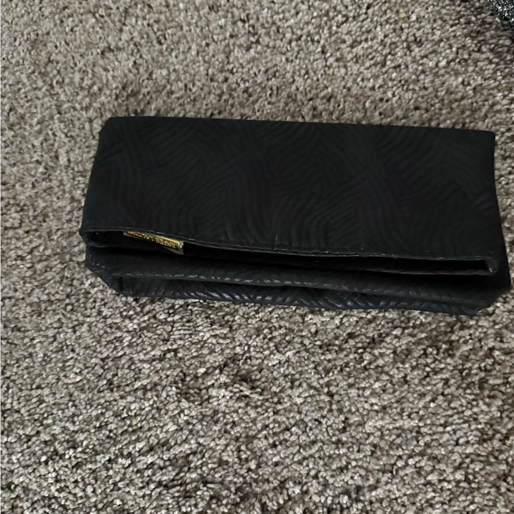 Estée Lauder & Lancôme
Elegant Black and Silver Women's makeup bags/ Clutch Set - Picture 2 of 7
